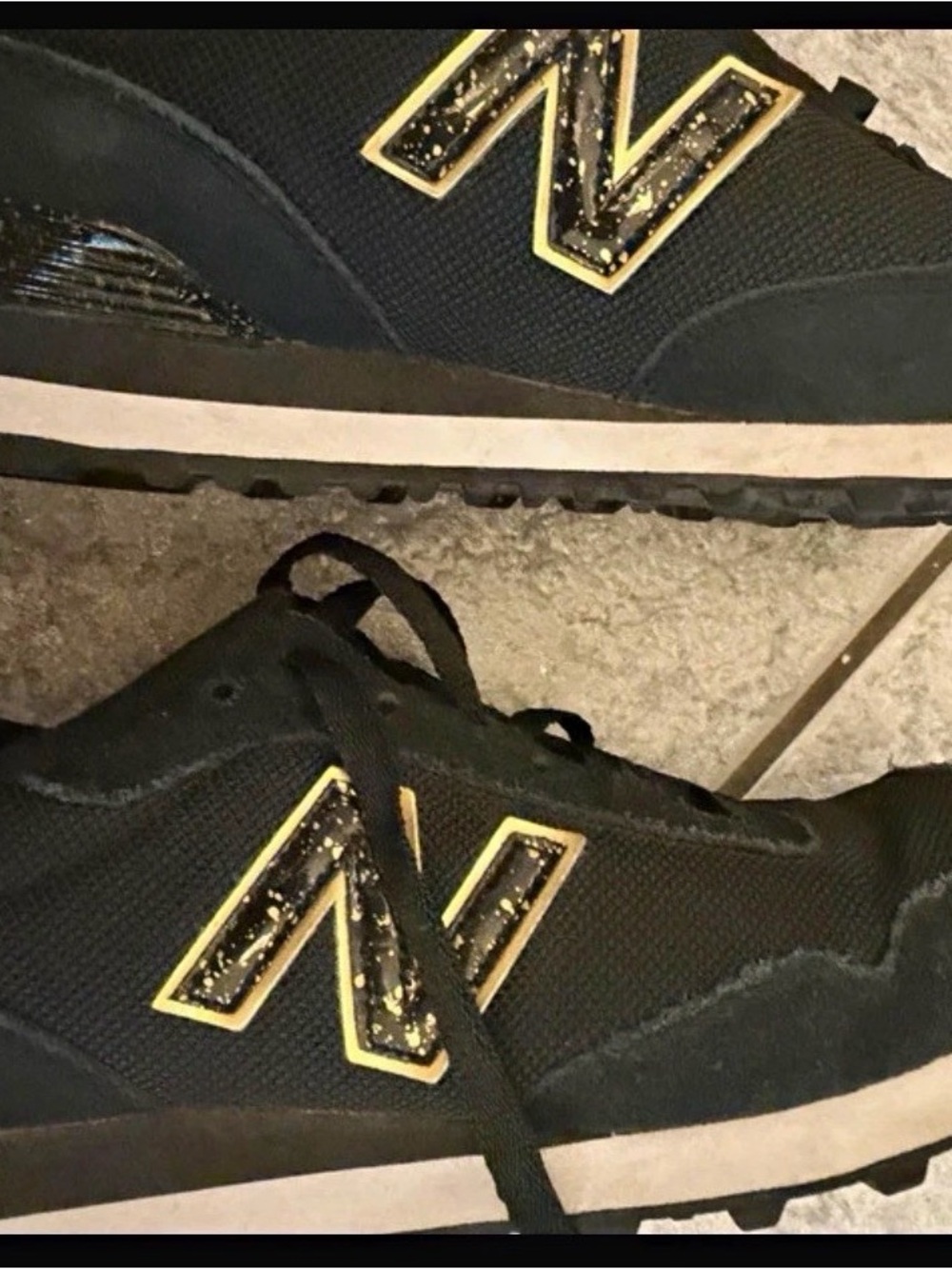 New Balance Black Sneakers with gold Accents